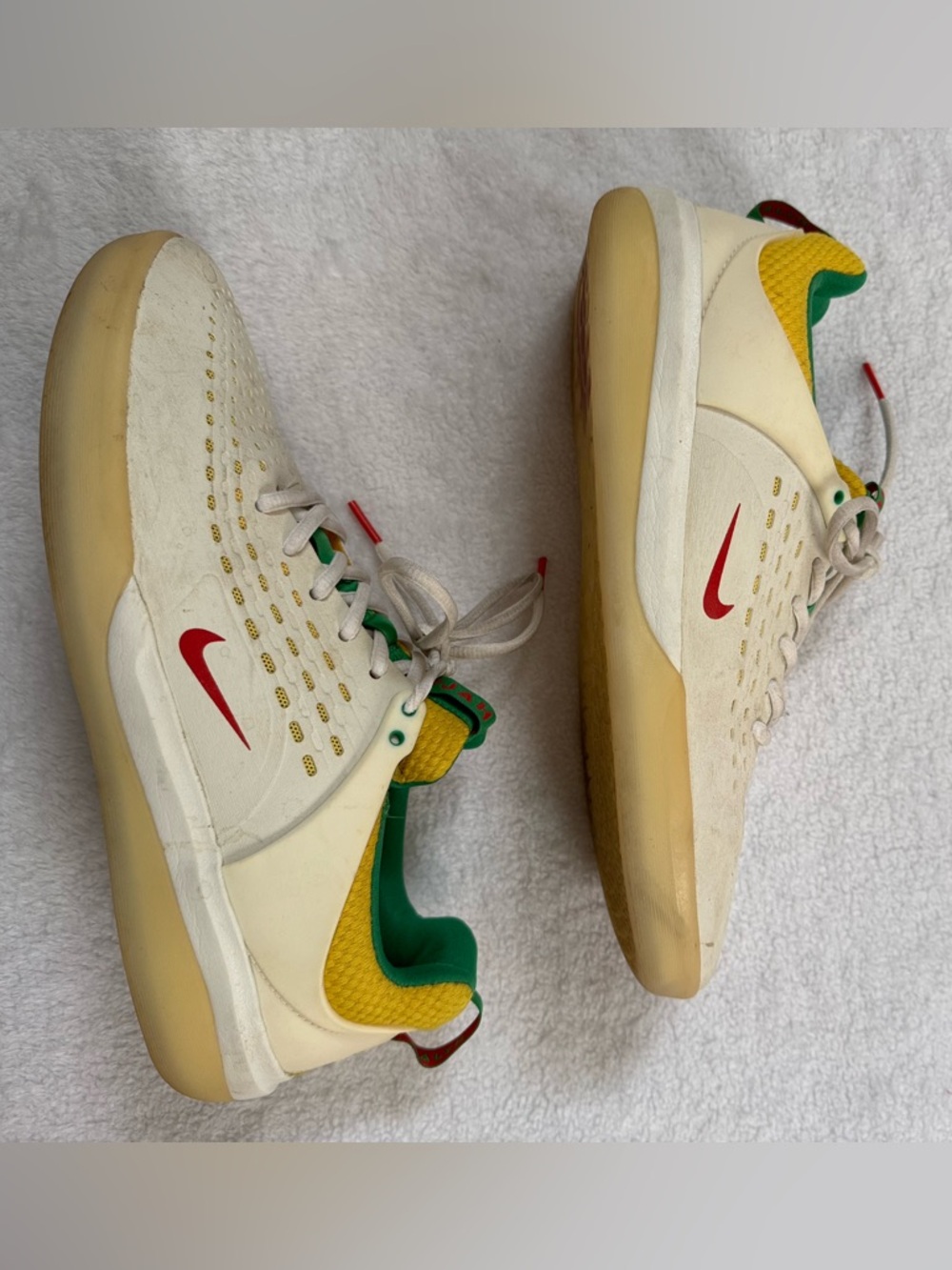Nike Cream Low-Top Sneakers with Red Swoosh and Green & Yellow Accents